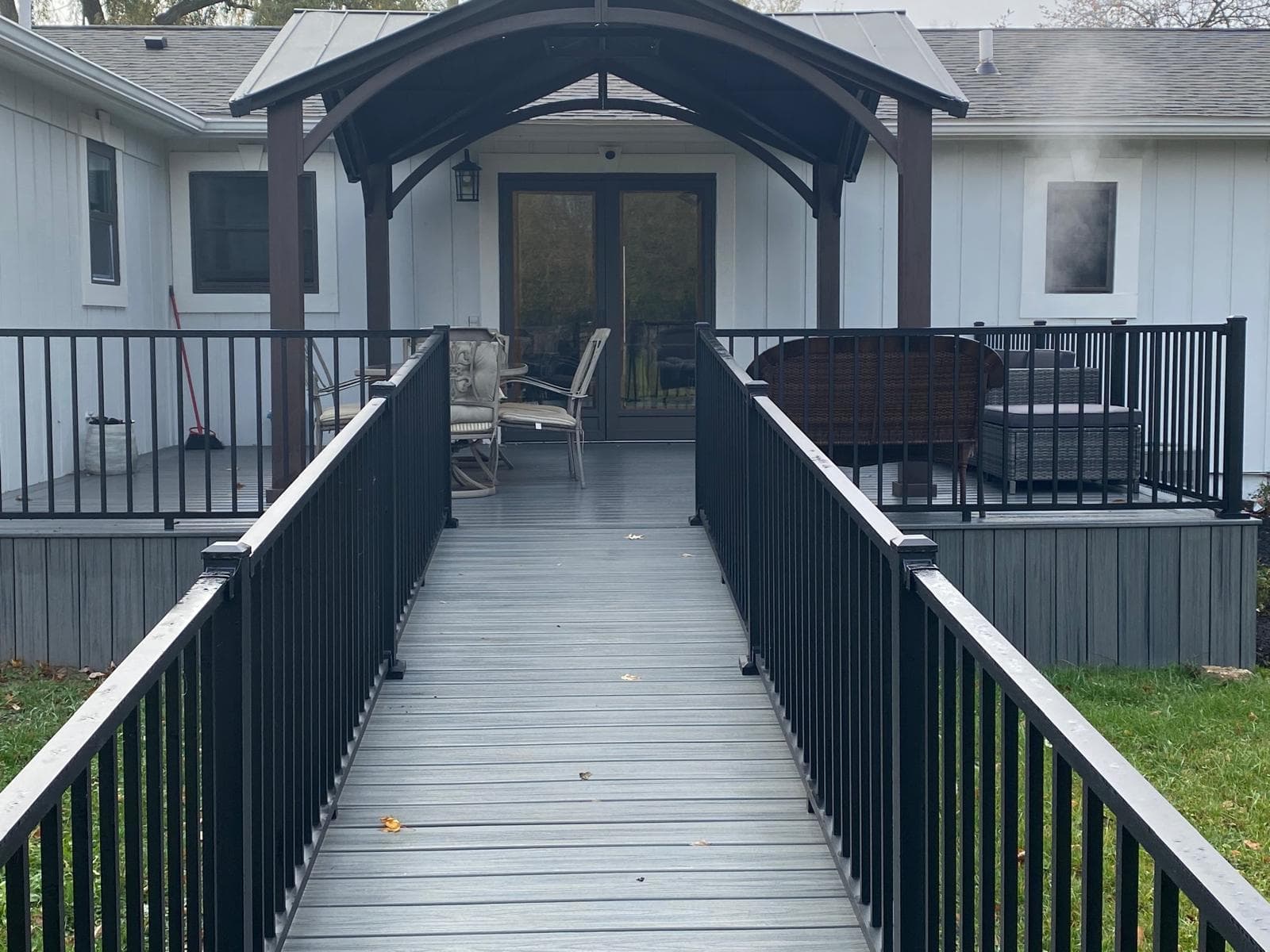 Peaceful Manor Farmington Hills — Accessible ramp to the covered back deck