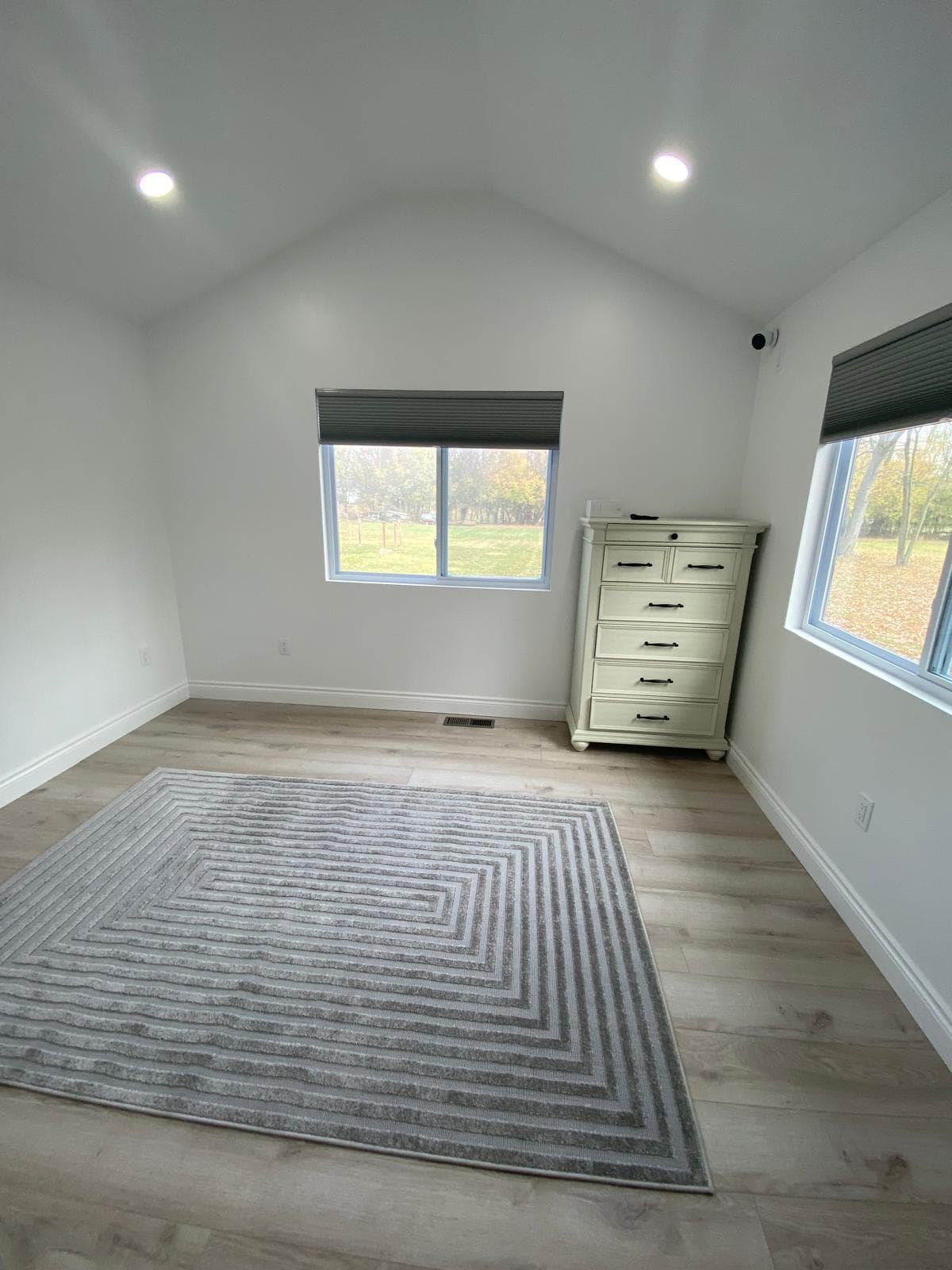 Peaceful Manor Farmington Hills — Resident room with vaulted ceiling